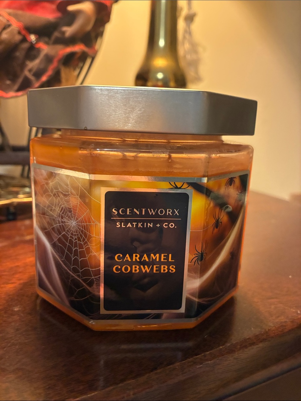 ScentWorx Slatkin + Co. 3-wick scented candle in the "Caramel Cobwebs" fragrance